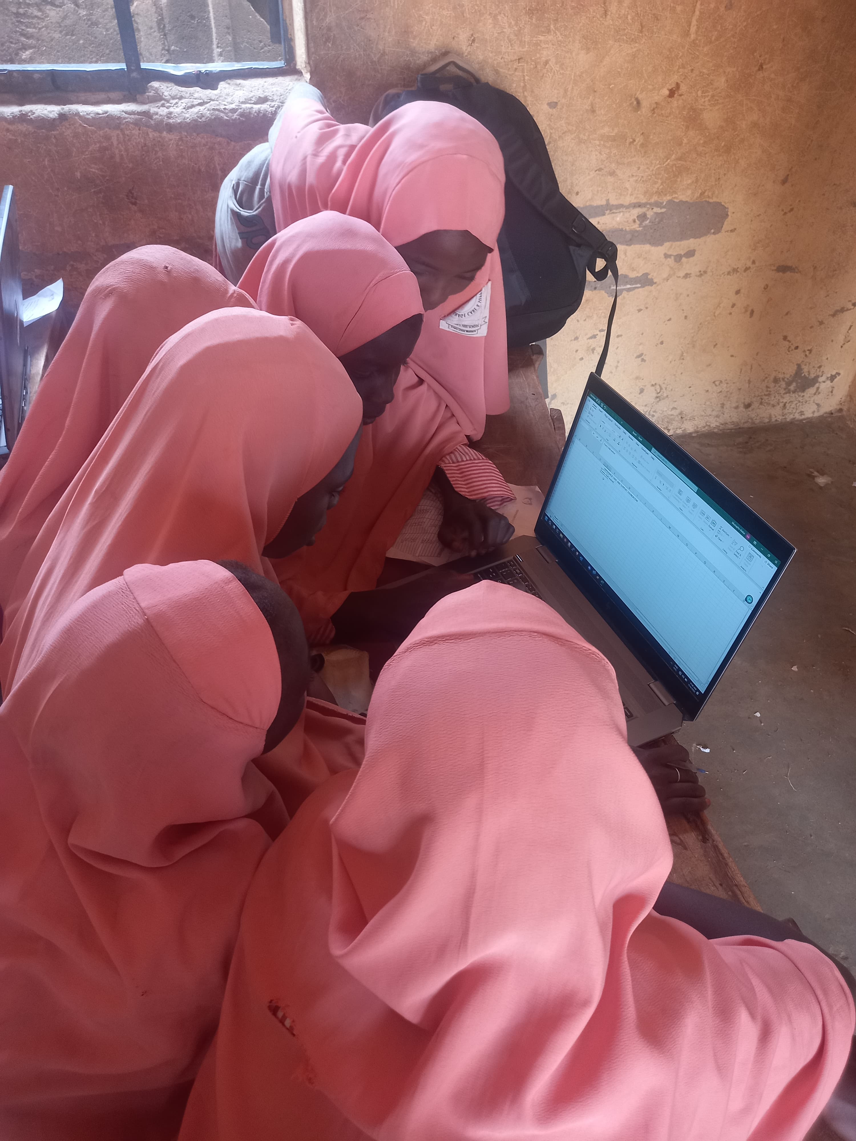 Orphan care school pupils learning IT fundamentals